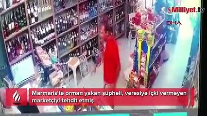 Marmaris'te orman yakan şüpheli, veresiye içki vermeyen marketçiyi tehdit etmiş