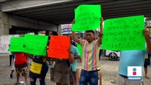 Choferes de trasporte público en Acapulco bloquean el puerto