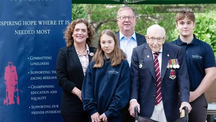 Why is Captain Tom's charity under investigation?