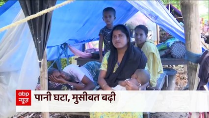 Assam Flood: उतर रहा बाढ़ का पानी पर लोगों की मुश्किलें बरकरार, सड़क किनारे रहने को लोग मजबूर