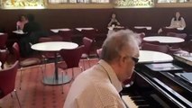 Deaf blind pianist Mark Pampel performs at the Victoria and Albert Museum