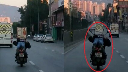Motosikleti yüzüstü yatıp kullandı: O anlar kamerada