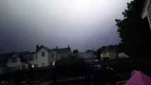Lightning Strikes Above Home Lighting up Sky
