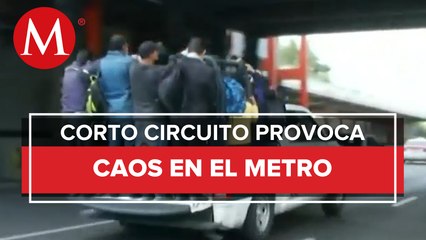 Trasladan usuarios del metro en camiones por corto circuito en linea 2