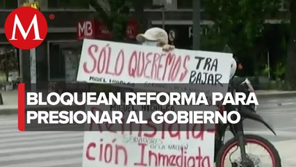 Trabajadores de gobierno protestan en palacio nacional, CdMx