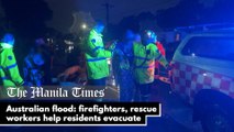 Australian flood: firefighters, rescue workers help residents evacuate