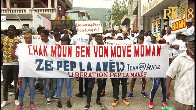 Mach pasififik nan Pòtoprens pou mande liberasyon Ezéchiel Alexandre Lapolis arete.