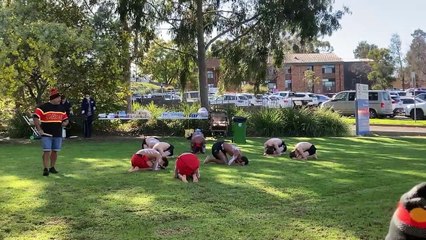 Murrumbidgee Boys Dance Group performs outside Griffith Base Hospital
