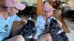 Adorable Border Collie showers owner with love  kisses as he returns home from fishing trip