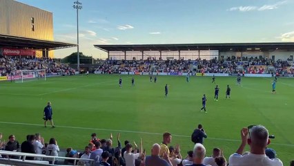 Leeds United fans applaud the team after beating Blackpool