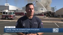 Officials give update on fire burning near 5th Avenue and Washington Street in Phoenix