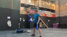 Comedian Performs Cool Tricks While Juggling Clubs