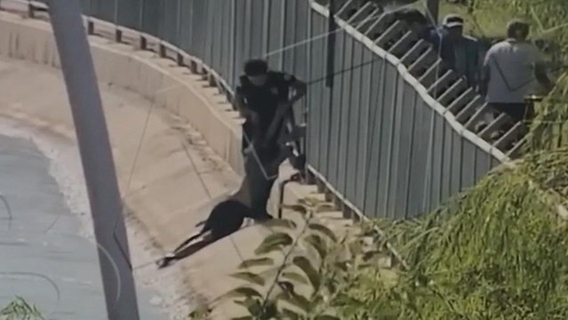 Video çekerken sulama kanalına düşen kadını polis kurtardı