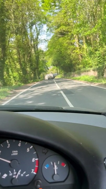 Watch the horrifying moment a drunk driver slams head-on into a motorcyclist