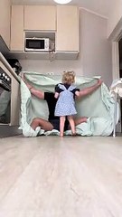 Daughter Surprised by Dad in Bed Sheet