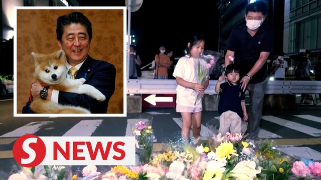 Nara residents leave tributes at scene of shooting