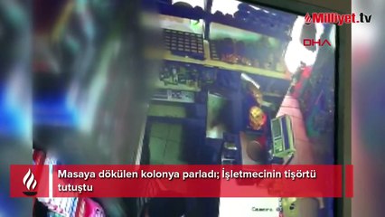 Masaya dökülen kolonya parladı; İşletmecinin tişörtü tutuştu