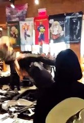 Brodie King attacks Darby Allin at a signing
