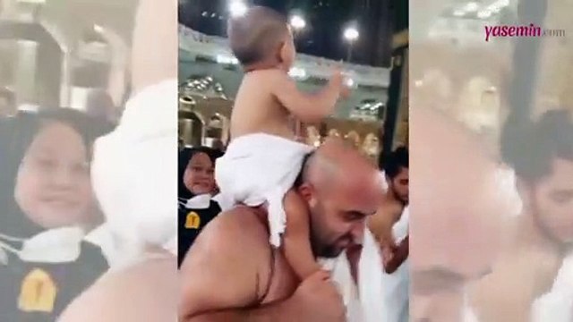 Babasının omuzlarında Kabe'yi tavaf eden minik hacı
