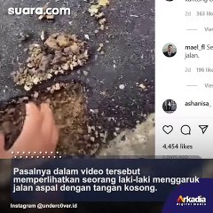 Pria Ini Garuk Jalan Aspal Hingga Hancur Pakai Tangan Kosong