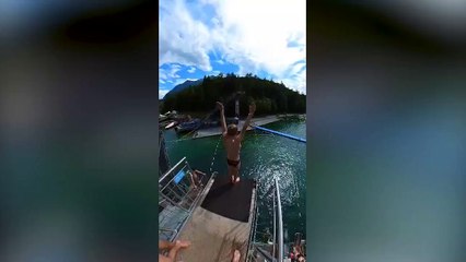 MAKING A SPLASH - This amazing video shows a talented teenager diver making a splash with an incredible 15m (50ft) dive from a springboard