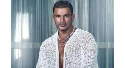 عمرو دياب يلتقط صورة مع عمال فندقه ويهنىء بسنت حميدة بعد فوزها بالذهبية