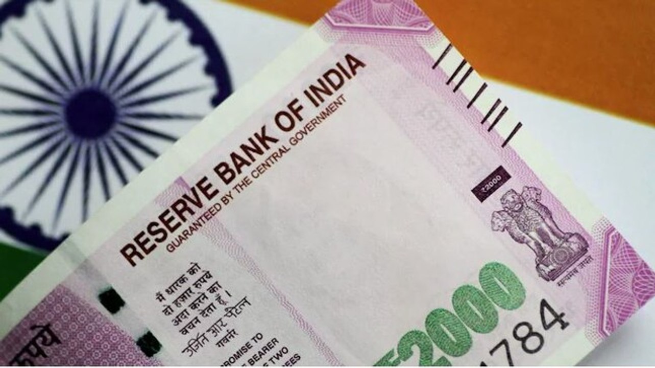 Rupee hits a new low, inches towards 80 against...