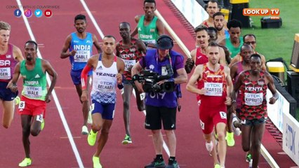 Cameraman causes chaos at the men's steeplechase.