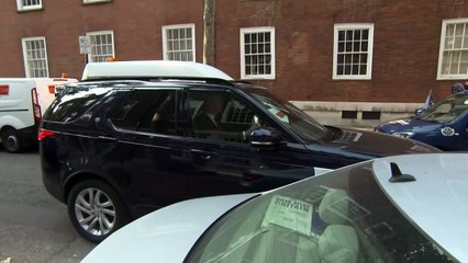 Smiling Sunak arrives at campaign HQ after poll success