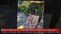 Oyuncu Melis Sezen renkli bikinisiyle şezlongda sere serpe poz verdi