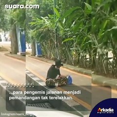 Tertangkap Kamera Asyik Bermain Telepon Genggam, Pengemis Ini Jadi Perbincangan Publik