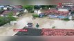 Viral Video: বন্যায় ভেসেছে গ্রাম, তিন মাসের শিশুকন্যাকে মাথায় নিয়ে জল পেরোলেন মা
