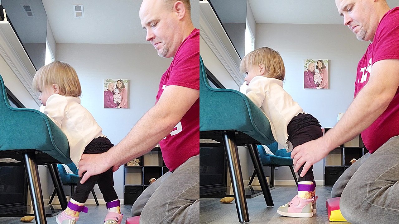 Determined dad helps partially paralyzed daughter with practicing standing INSPIRATIONAL