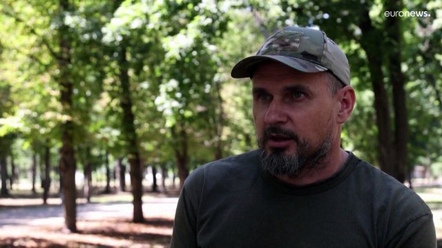 Ukrainian filmmaker Oleg Sentsov swaps his camera for a rifle