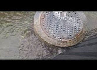 Sewage water bubbles out of the main near Maree Brown's property