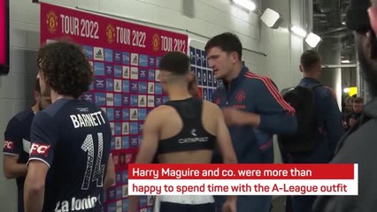 Melbourne Victory players queue for Man United autographs