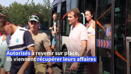 Incendies en Gironde: des campeurs évacués viennent récupérer leurs affaires