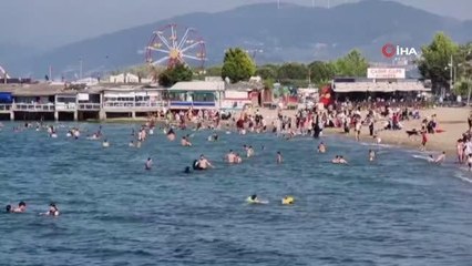 Sıcak havayı fırsat bilen günübirlikçiler denize akın etti
