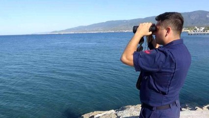 Balıkesir'de teknenin batması sonucu kaybolan 2 kişiyi arama çalışması sürdü