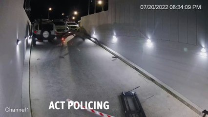 Stolen vehicle breaks through garage and swipes police car | Canberra Times | July 21, 2022