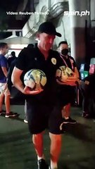Coach Alen Stajcic gives football to kids