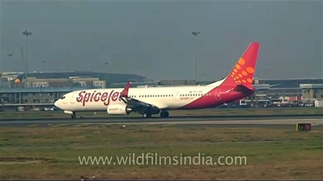 Spicejet plane taxiing off from tarmac at Delhi airport