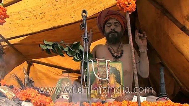 Naga Sadhu meditating at his camp in Juna Akhada during Maha Shivratri