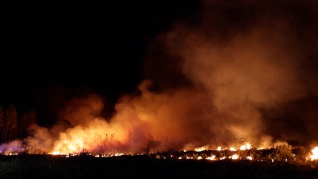 Controlled burns performed as firefighters battle wildfires