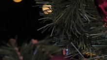 the spheres of a Christmas tree lightening the mood