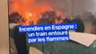 Incendies en Espagne: un train entouré par les flammes