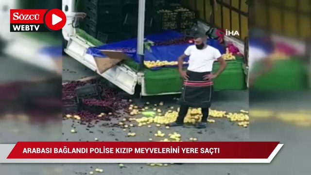 Arabası bağlanan seyyar satıcı, polise kızıp meyvelerini yere saçtı