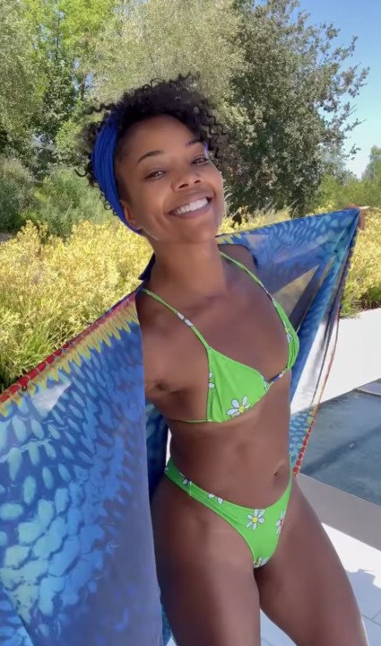 Gabrielle Union Danced Around Poolside in a Lime Green String Bikini