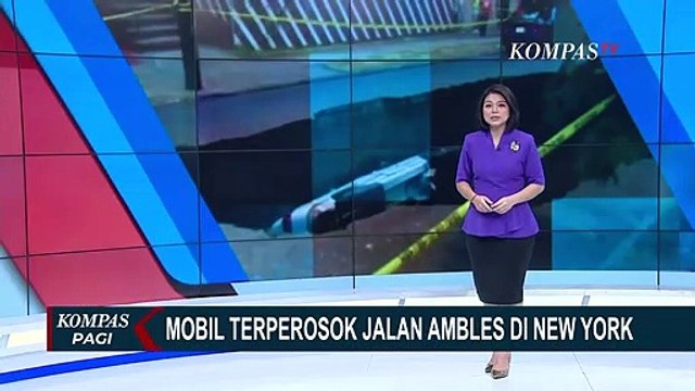 Sebuah Mobil di New York Terperosok Masuk Jalan Ambles