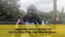 Simba Arati protests over the destruction of his campaign materials